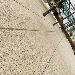 自贡 黄金麻花岗岩荔枝面外墙干挂石材效果示例