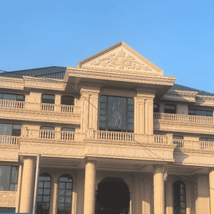 自贡黄金麻别墅外墙干挂石材效果示例