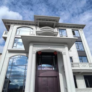 自贡白麻别墅外墙干挂石材效果示例