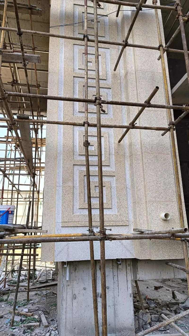 自贡 黄金麻花岗岩别墅外墙干挂回纹造型效果